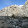 Trail from the parking turnout. After about 100 yards the trail goes up a little bank and forks. Continue straight to access the Crack of Noon, Fashion slabs, and G.o.T Crag.