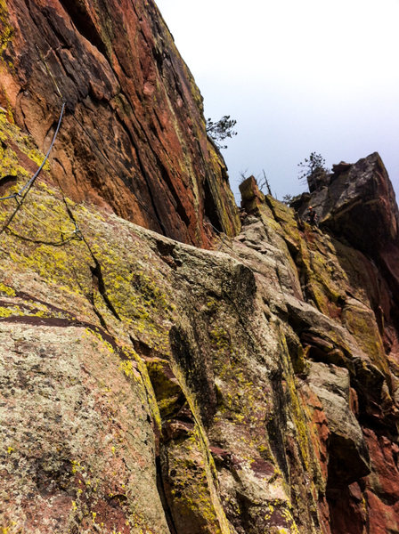 Three-Stage Traverse crosses the ledge before heading up to the top of the ridge. 