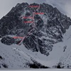 Dragontail Peak from the far end of Colchuck Lake.  Triple Couloirs marked.