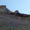 Pulling the roof on Pitch 1 of Tales from the Gripped.