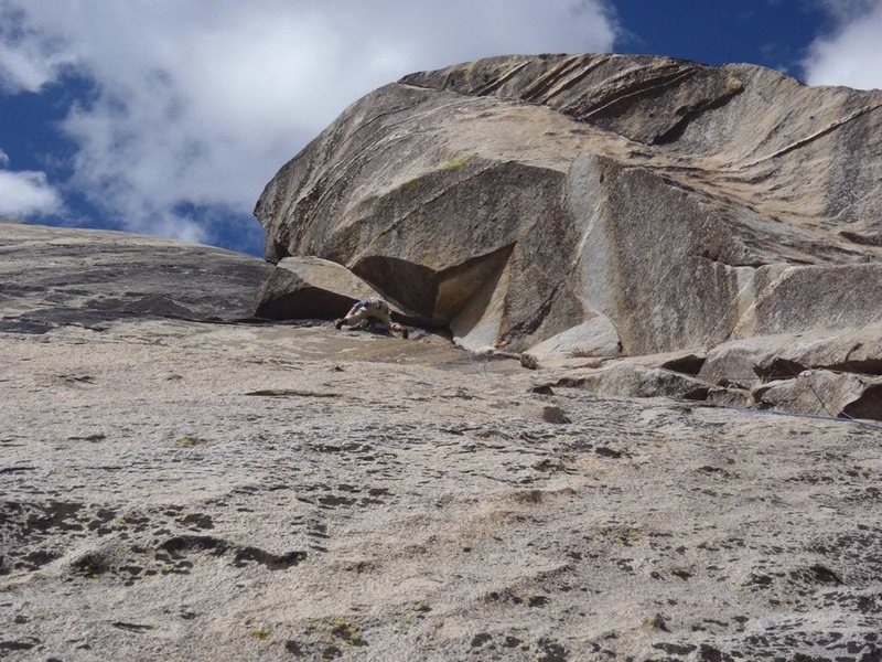 David B. post crux of the climb.  Headed left to the bolt anchor just to the side of the formation overhead.<br>
<br>
Pitch 4 goes up the dihedral.