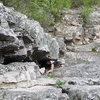 Tara climbing through the chimney on the second pitch (first pitch being first pitch of old mans)