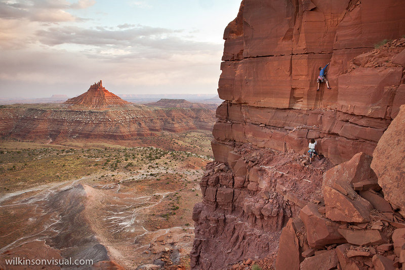 Sunrise ascent, first pitch with north shooter in background.