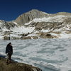 Jeff near frozen-over Steelhead Lake, North Peak's North Face in view. Northwest Ridge on right skyline.