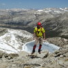 Barry on NW Ridge, looking northwest with Upper McCabe Lake below.  Tower Peak is left of center; Whorl Mtn (South, Middle, and North), Matterhorn Peak, Virginia Peak are off to right.