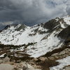 Still 2 hours from car, after summiting, clouds gathering rapidly.  Spinkles and a few lightning flashes an hour later.