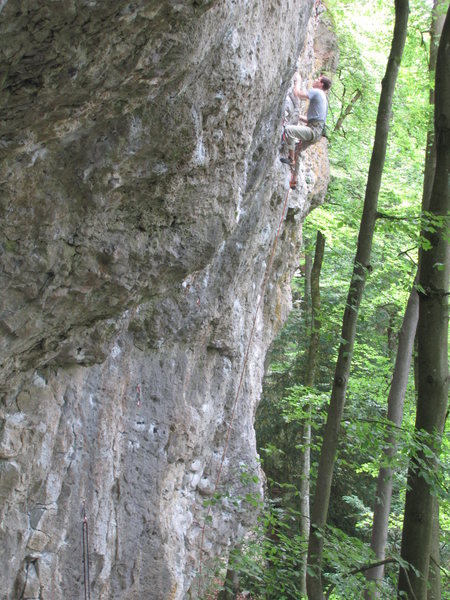 A climber at the crux of Dezentraler Energiepfad.