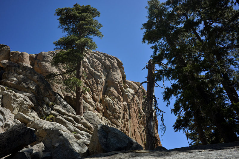 Southwest Face of Castle Rock. <br>
<br>
The climbing rope in this photo hangs atop the Great Steps of Cheops and crosses the Sphinx and Ball & Chain.