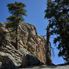 Southwest Face of Castle Rock. <br>
<br>
The climbing rope in this photo hangs atop the Great Steps of Cheops and crosses the Sphinx and Ball & Chain.