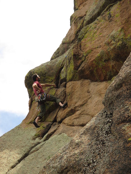 Joe heads into the steep (steeper than it looks) crux of the NW Arete (5.9+) on Desdemona.