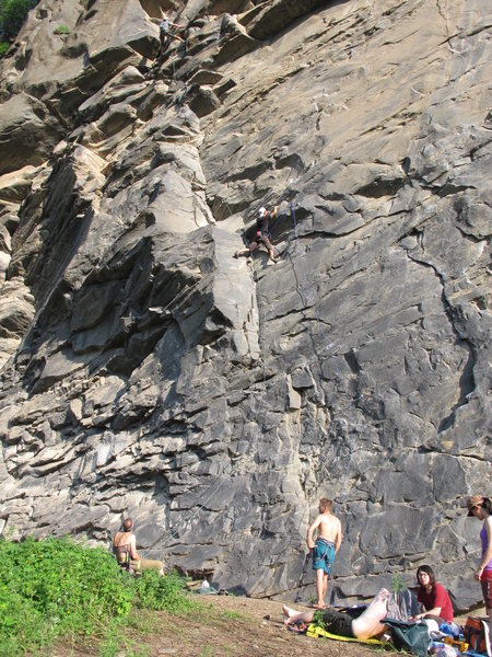 Qiliang, to the upper left, almost at the top of the climb.