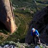 Rappelling from El Fire after climbing Directa as Cimas.  El Pison in the background.