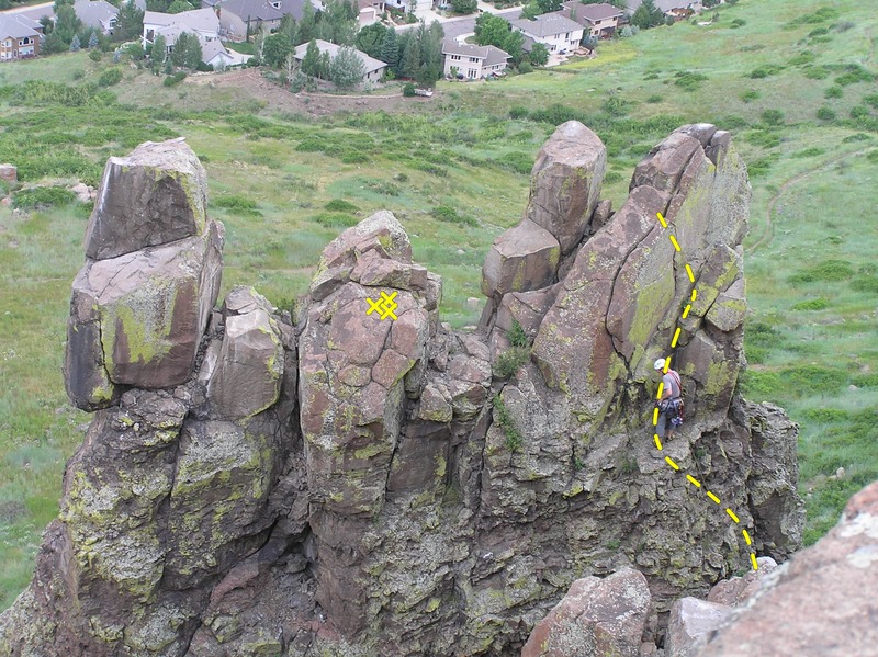 Getting the first good gear placement in just above the poor rock. This shows the majority of the route.