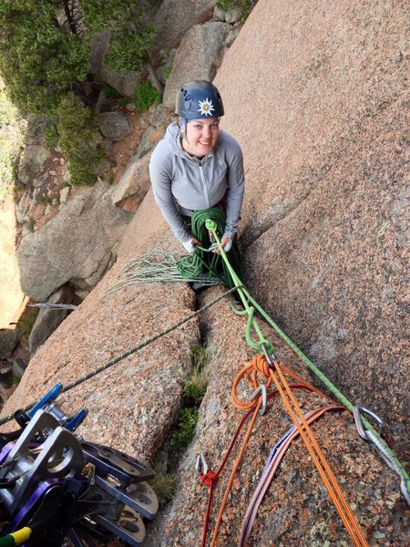 The top of P1: rock horn has been used as a rap in the past (old tat and leaver-biners). I slung this and back it up with a 0.75 and stopper in the crack to the RIGHT of the next pitch (I also used this as my first piece of pro and led high up into the second pitch before placing an absolute nuclear bomb proof #2 Camalot. The initial 30 or so feet of P2 is good hands.<br>
Another option if weather is threatening OR if the first pitch gave you ANY trouble is to bail from here.