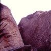 Dave drilling a 1/4"er to get through the offwidth crux