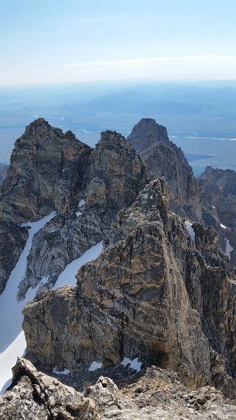 Looking east from the summit of the south teton.  Summits in order:<br>
Ice Cream cone, Gilkey Tower, Spalding (not visible), Cloudveil Dome, Nez Perce 