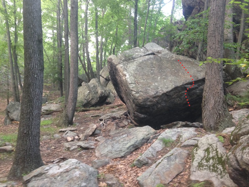 Spiderman cave is the line right of the low apex of the boulder.