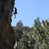 Jason clipping the anchors on Out of Sight (5.10b), 8000 Foot Crag