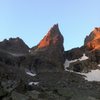 The Northeast Ridge is in the center of the formation painted by the sunrise.  It turns into a bit of a flying buttress.