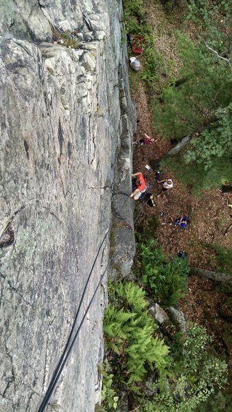 Looking down on the route.  The climber is hiking up the 5.4 section to the first ledge.