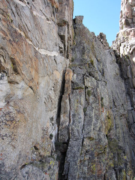 This is your 5.5 exit should you decide to do the "walk off" which is really scrambling on very loose scree and many obligatory rappels or hopping into alternate gullies. There must be three of them damned gullies over there! 