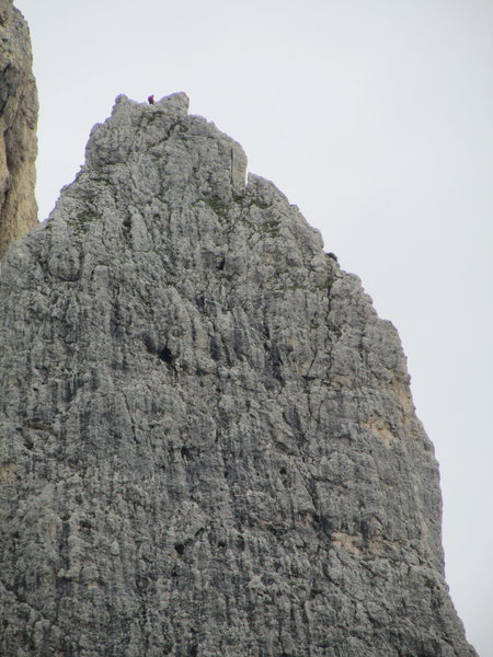 Solitary climber atop Kleiner Falzaregoturm