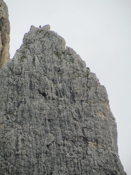 Solitary climber atop Kleiner Falzaregoturm.