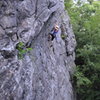 Kris working the over hanging section near the top of the temporarily named Cellphones are dangerous.