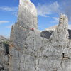 Unknown climbers at belay ledge on Torre Inglesi.