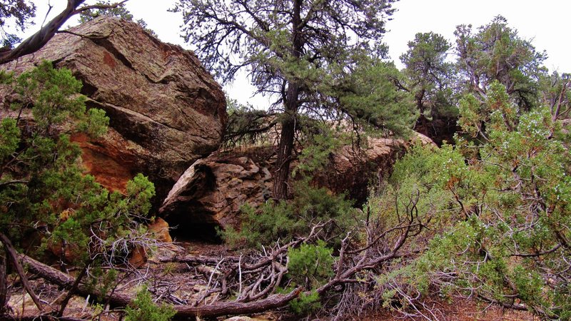 Bonetop Boulder is on the right. It's easy to miss this one, as the trail passes by the uninviting west face.