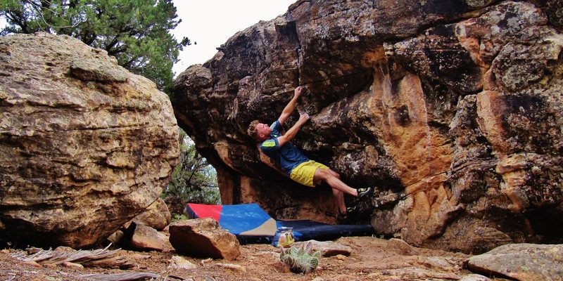 About to pull into the crux sidepull of Protoplus.