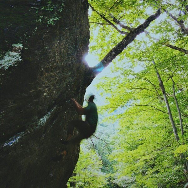 Myself climbing on The Roots boulder, Smugglers Notch, VT.<br>
Very unique boulder!