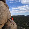 Just below the crux of Supercalibelgolistic (5.9), Holcomb Valley Pinnacles