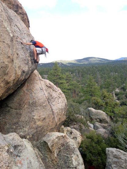 Chris at the crux on Supercalibelgolistic (5.9), Holcomb Valley Pinnacles