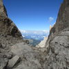 There's a fairly good trail system in the Dolomites, and a good but steep trail ascends from the Comici Hut to the Langkofelscharte. This view is looking down the valley towards Wolkenstein (Selva).