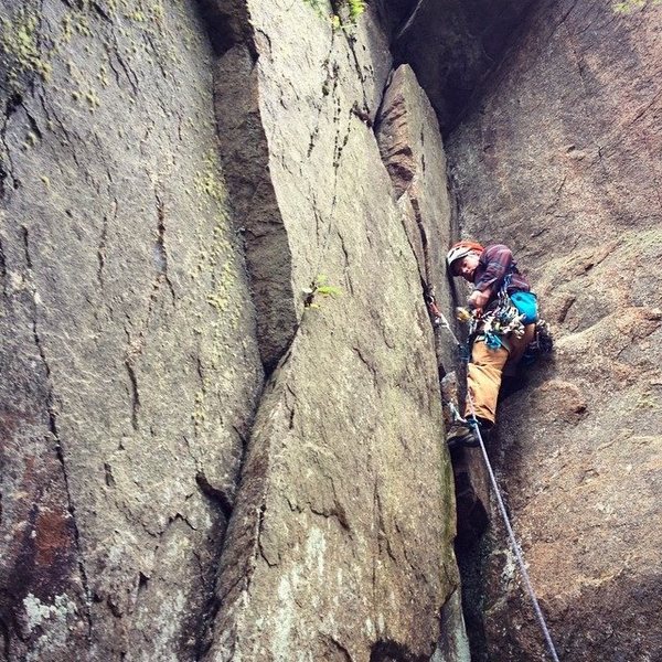 Ben Greene placing gear on Birch Tree Corner. Photo by Kari Post.