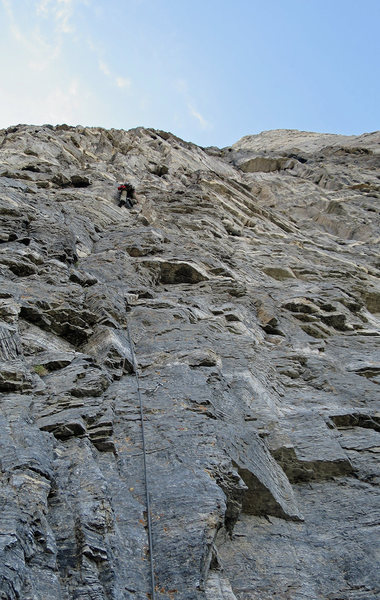 Darren midway up the first pitch. The lowest bolt visible is the first bolt of the route.