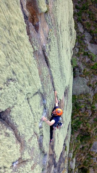 Steve setting up for the crux move into the fine crack on Venus Flytrap