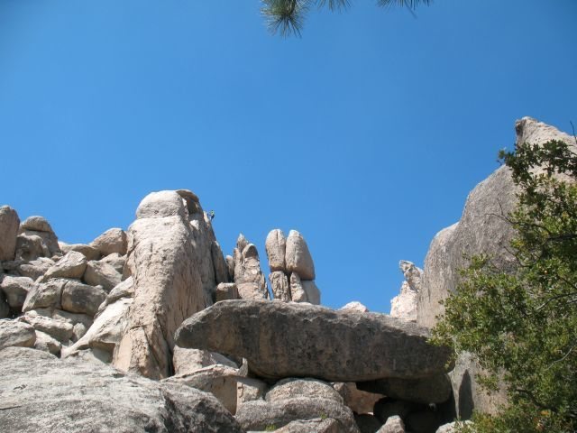 Climber at the top of the Katrina Wall, Holcomb Valley Pinnacles