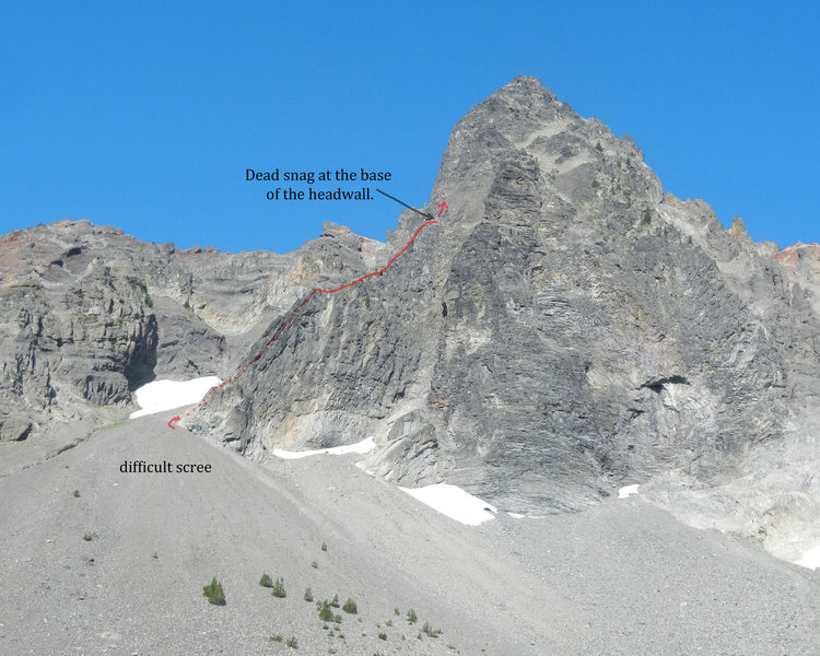 The route as seen from the basin due east of the mountain. The starting fun slab is just around the corner and behind the lower part of the spur. The ridge just to the right of the SE Spur is the E Buttress.