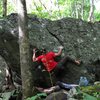 FA of "Rooster" on the Rooster Boulder