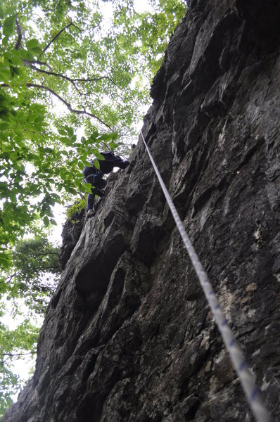 Madame Butterfly follows the toprope... Climber on Common Ground.