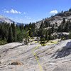 Slabs leading downhill from the Olmsted Crack (V1) to the Forbidden Swamp and beyond to the Back Breaker Cliff.