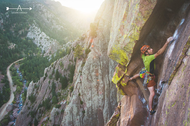 Scott Bennett enters the famed Bombay Chimney on The Naked Edge, Eldorado Canyon SP, CO. 