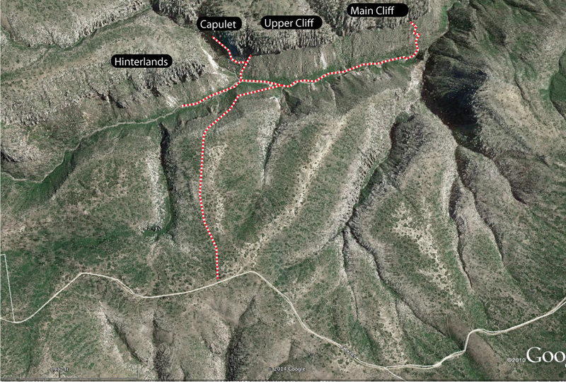 Look for the path going out the obvious ridge, straight to the canyon. Use this approach for all the various areas. On top of the broad mesa, the path is marked with parallel logs often enough to keep you going right if you keep your eyes open. If you're on the track when you get to the edge of the cliff, getting down is easy. Once in the wash, hike up canyon and look for cairns to show the best way to the Upper Cliff/Capulet. The Main Cliff has a fairly easy way up, opposite the major side canyon opposite it and 3/4 of the way down its length. 