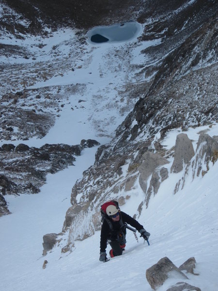 Steve ascends firm snow on a Ptarmigan Finger couloir.