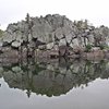 The Rocky Island's 'North Wall' on a grey calm day.  Photo Dave Rockwell