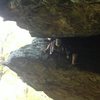 Dylan Oliver's behind on the first ascent of The Moose's Tooth.