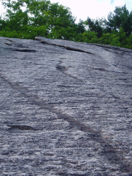 Looking Up from top of the shallow corner; the bolts are in the right-hand "dike" leading to the flake.