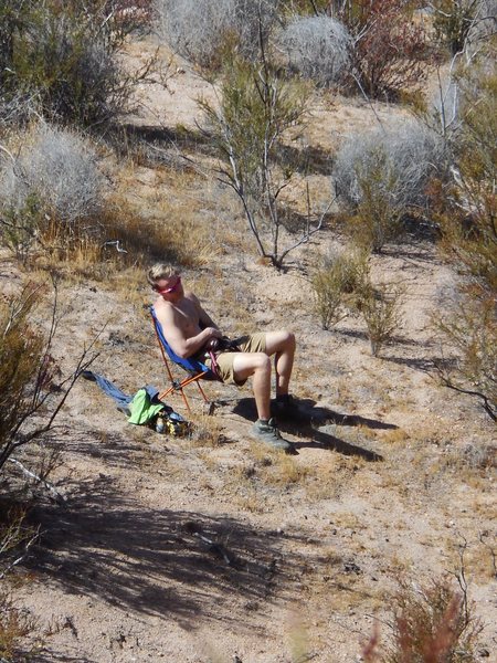 Fortunately, he's not belaying, just catching some rays near the base of the Korean Route.